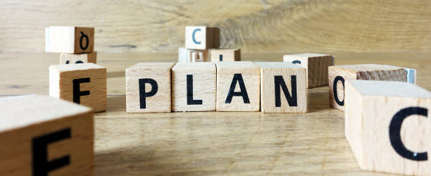 istock Plan the word arranged with wooden letters. 1371828192