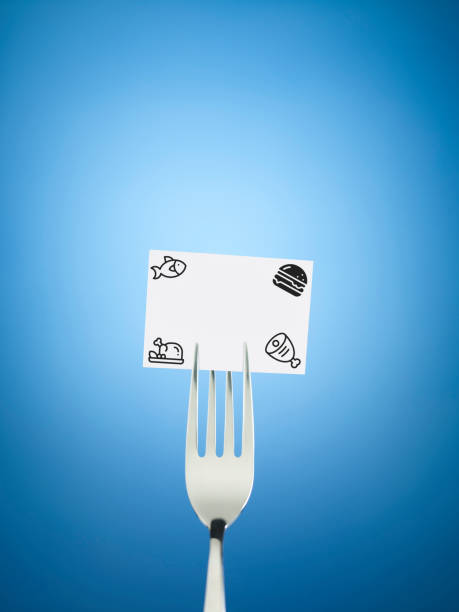 Fork and a banner with food icons on blue background