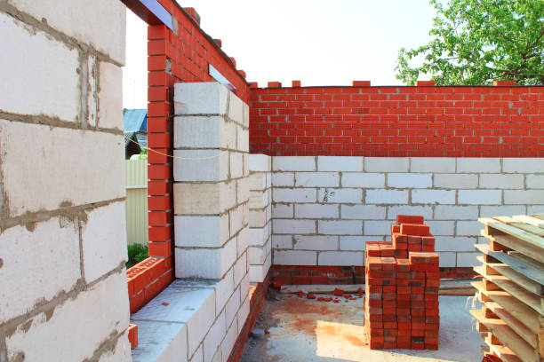 istock Building a house of bricks and blocks. Background. 1371834200