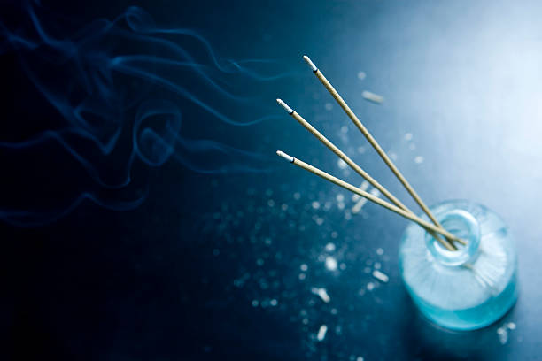 burning incense stock photo