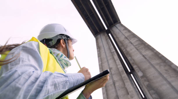 istock Female road engineer working. Building new highways. 1371842069