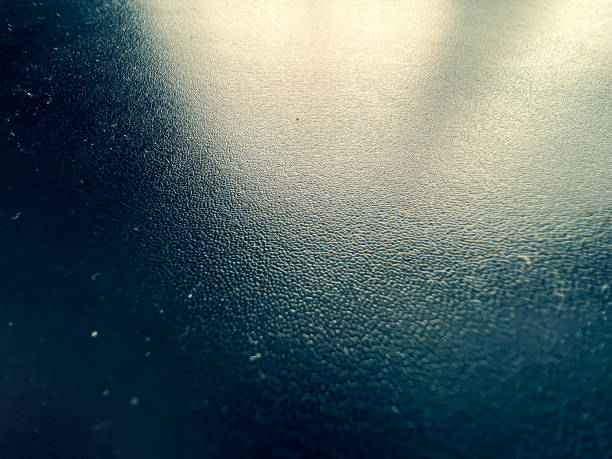 istock Very fine black leather as texture or background. 1371845194
