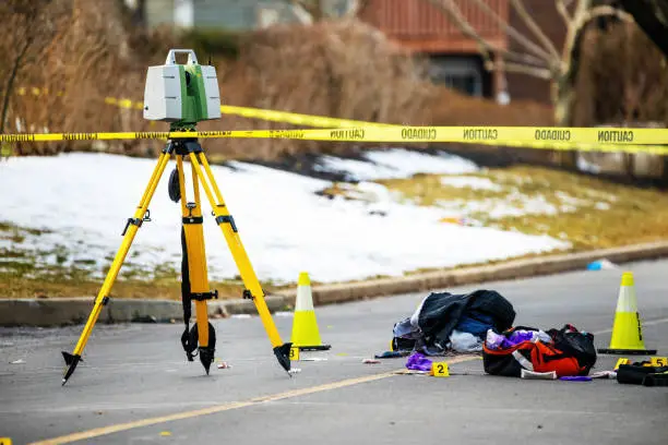 Caution tape with crime scene evidence during road accident nobody