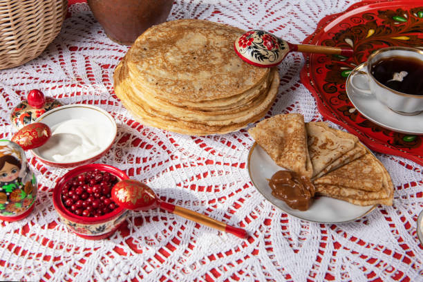 istock Russian pancake blini with berries and sour cream 1371849230