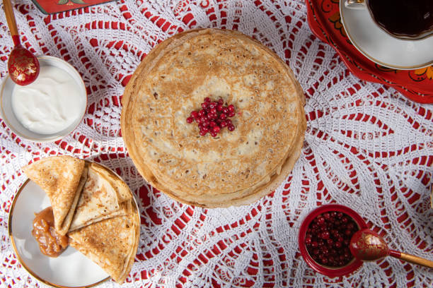 istock Russian pancake blini with berries and sour cream 1371849282