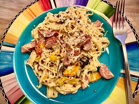 Plate of sausage pepper pasta.