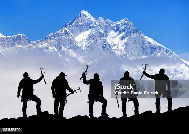 Mount Lhotse Silhouette Climbers With Ice Axe In Hand Stock Photo - Download Image Now