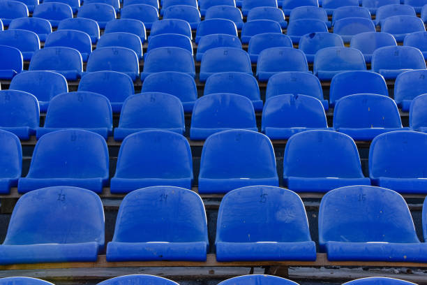 istock Dirty seats at the stadium without the visitors 1371858593