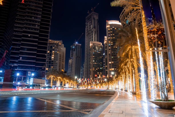 Dubai downtown city center skyline view at night Dubai, UAE. February 14, 2022. Beautiful view to Dubai downtown city center skyline view at night, United Arab Emirates dubai street stock pictures, royalty-free photos & images