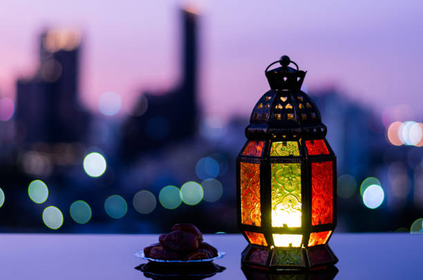 istock Lantern with dusk sky and city bokeh light background 1371859900