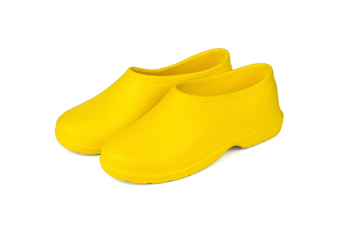 A Pair Of Bright Yellow Galoshes Isolated On A White Background Stock ...