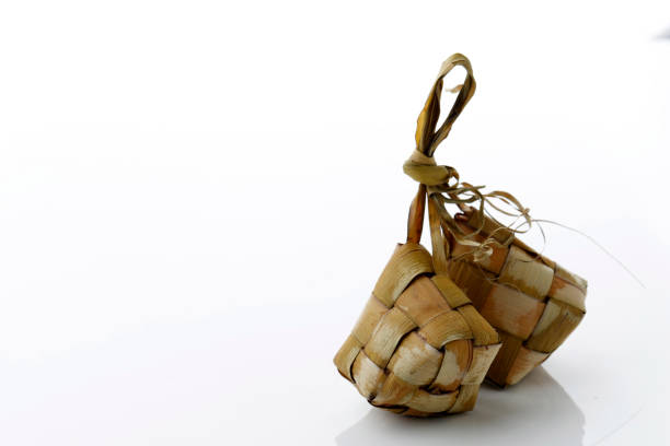 istock Ketupat Rice Dumpling Special Dish served at Eid Mubarak. Isolated on White Background. 1371862937