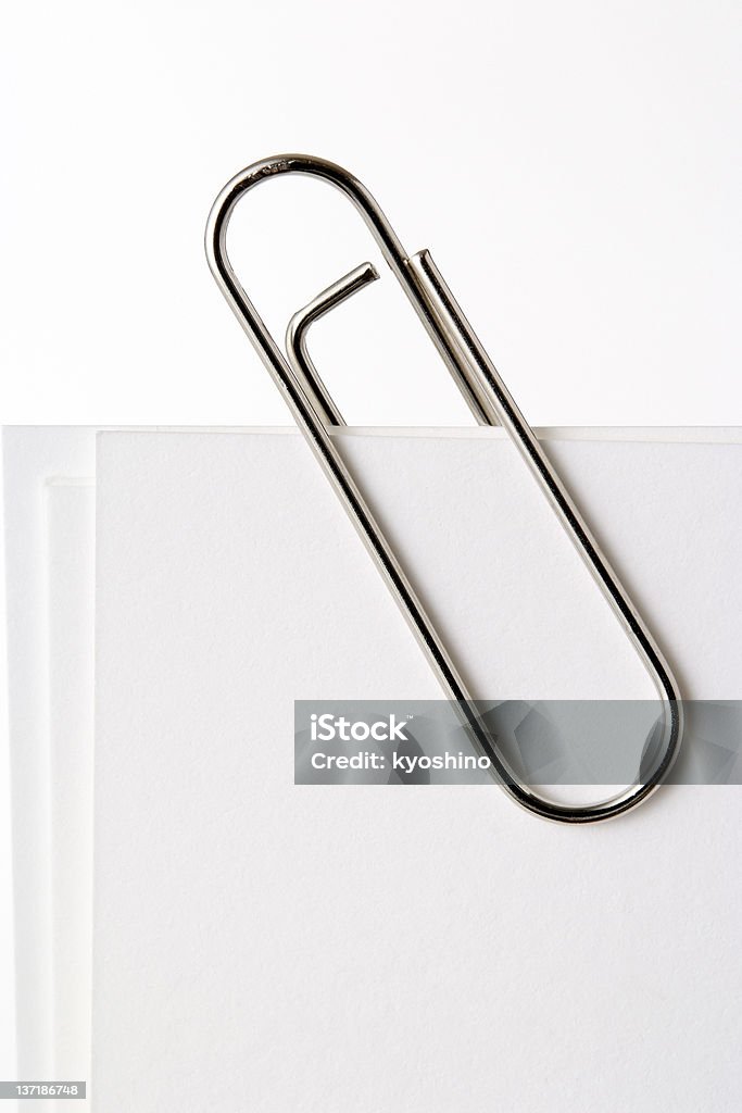 Aislado fotografía de documento con sujetapapeles sobre fondo blanco - Foto de stock de Acero libre de derechos