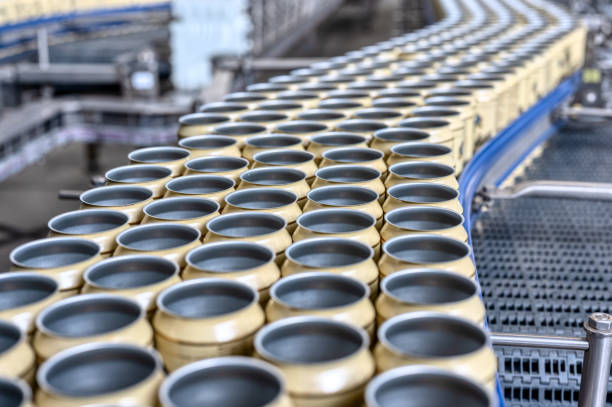 istock Many empty beer cans on the conveyor 1371875440