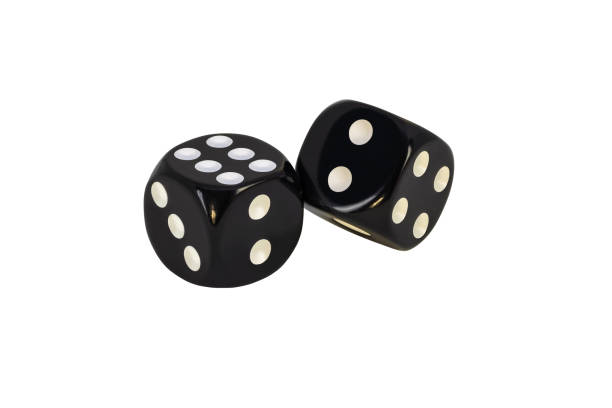 istock Two black dice are isolated on a white background. Complete clipping without shadow. The result is six and on the verge. 1371878326