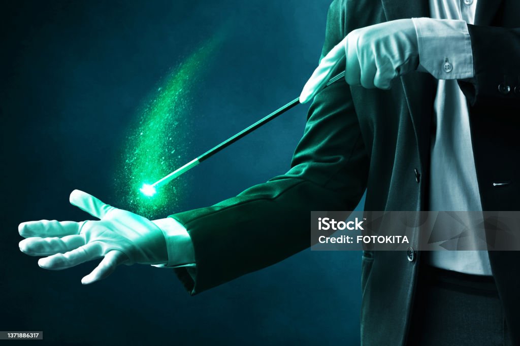 Magician hand showing magic trick Magician Stock Photo