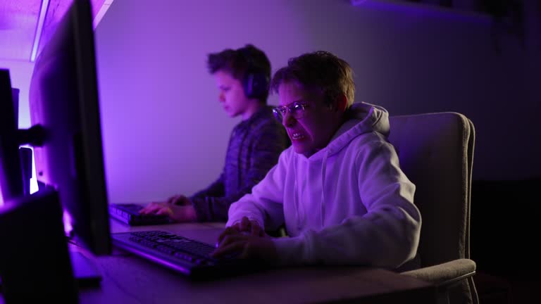 Kids playing multiplayer online games using desktop PC