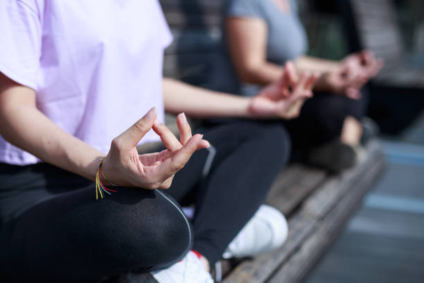 istock Close up of womens hand doing meditation 1371890807