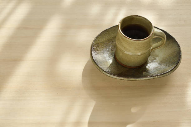 istock A cup of coffee on a wooden table 1371891190
