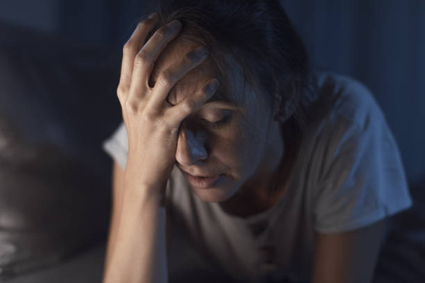 istock Desperate woman suffering from insomnia 1371894083
