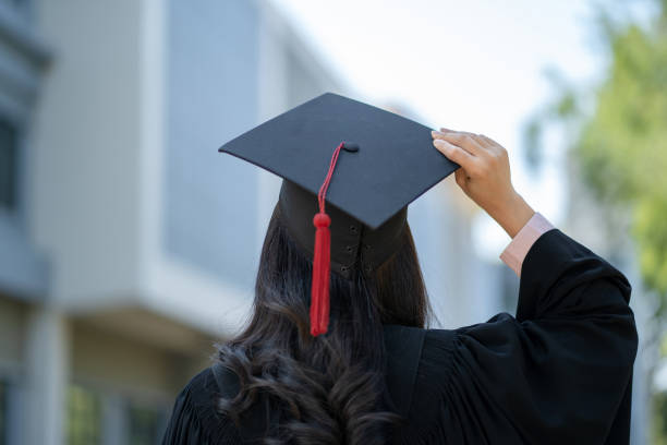 Happy Asian woman in his graduation day. Happy Asian woman in his graduation day. university stock pictures, royalty-free photos & images