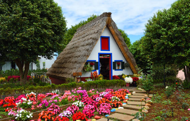 Santana, Madeira, Portugal - June 25, 2019: Traditional Madeira building with thatched roof.