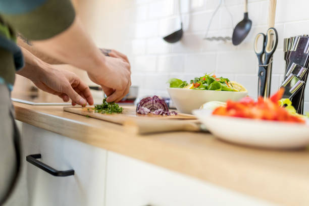 istock Slicing parsley for lunch 1371903709