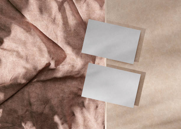 istock Blank white business cards with textile background. Mockup for branding identity. Two cards, to show both sides. Template for graphic designers. Free space, copy space. 3D rendering. 1371910607