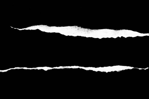 Ripped, torn paper edge isolated white on black, paper tear with space for copy Paper tear, ripped paper edge, torn edge, isolated paper tear white on black, paper corner with space for copy split pictures stock pictures, royalty-free photos & images