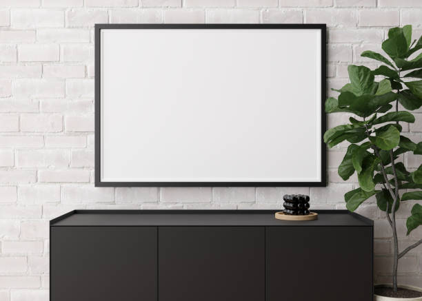 istock Empty horizontal picture frame on white brick wall in modern living room. Mock up interior in minimalist, contemporary style. Free space for your picture, poster. Console, candle, plant. 3D rendering. 1371913221