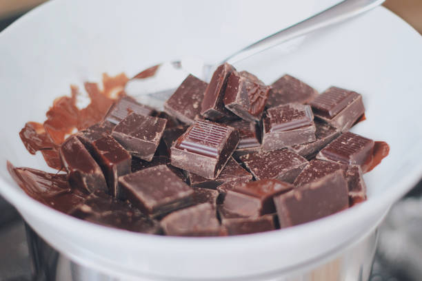 istock Melting cubes of dark chocolate 1371915378