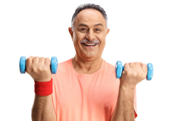 istock Cheerful mature man exercising with small blue dumbbells 1371916241
