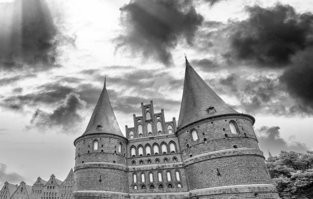 istock Holstentor gate in Lubeck at summer sunset - Germany 1371917447