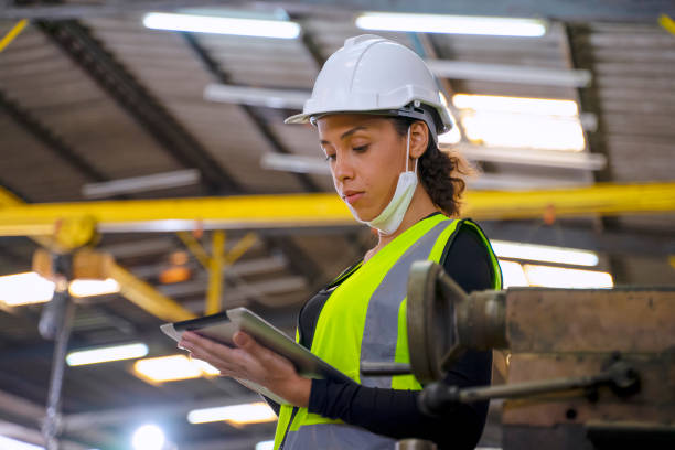 istock Blue collar worker at factory. 1371917660