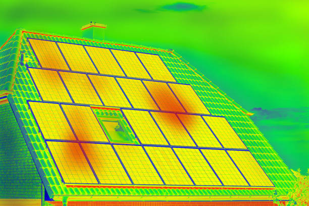 Thermographic inspection of photovoltaic systems by house.Thermovision image of solar panels. Infrared thermovision image. Infrared thermography in inspection of photovoltaic panels. Thermographic inspection of photovoltaic systems by house.Thermovision image of solar panels. Infrared thermovision image. Infrared thermography in inspection of photovoltaic panels. thermal image stock pictures, royalty-free photos & images