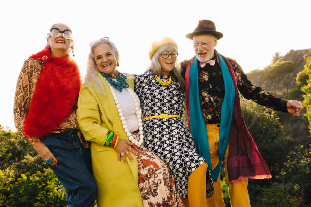 istock Senior citizens having fun together in a park 1371920763