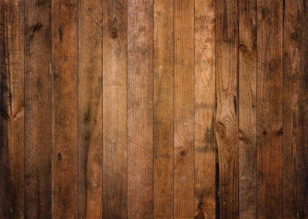 istock Old dark barn wood background texture. Weathered rough planks backdrop. 1371922650