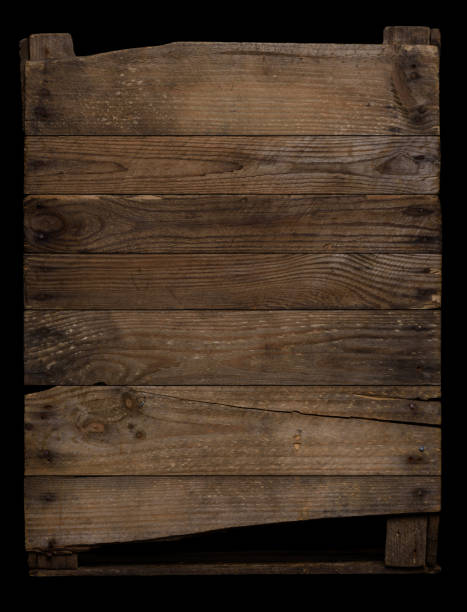 istock Weathered wood texture, with rusty nails, isolated on black. 1371922752