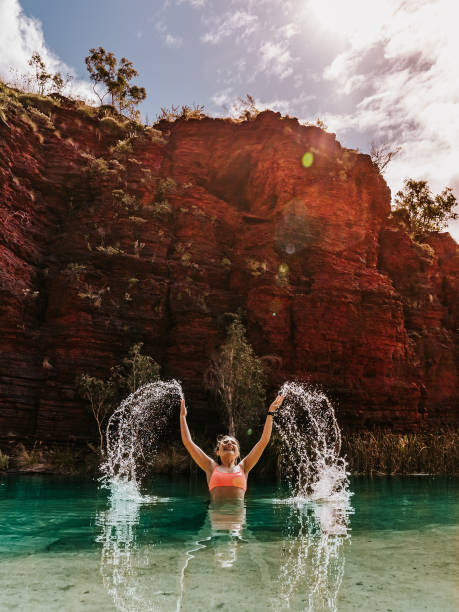 Outback Oasis The perfect place to cool down in Outback Australia. Exploring the gorges of Karijini National Park in Australia. western australia stock pictures, royalty-free photos & images
