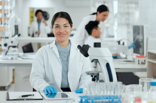 istock Shot of a young woman using a digital tablet in her lab 1371924793