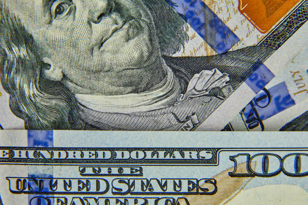 a close-up of a hundred US dollars of a new sample, details of a dollars 100 banknote