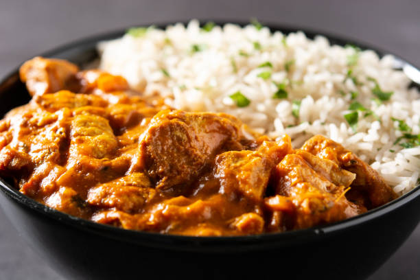 istock Indian butter chicken in black bowl 1371925703