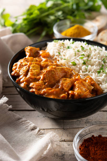istock Indian butter chicken in black bowl 1371925736