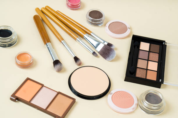 istock Group of cosmetic and makeup products on studio background 1371926682