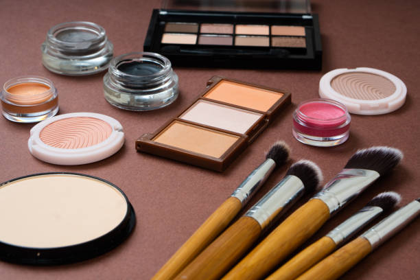 istock Group of cosmetic and makeup products on studio background 1371926855