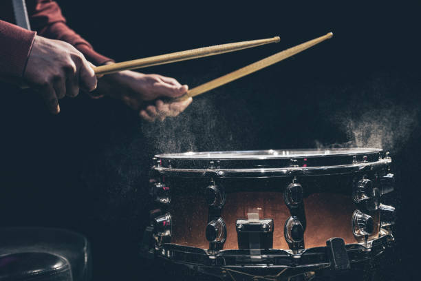 istock The drummer's hands hold drumsticks and play the snare drum. 1371927048
