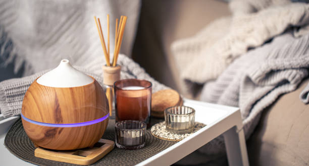 istock A cozy composition with an aroma diffuser and candles in a home interior. 1371928468