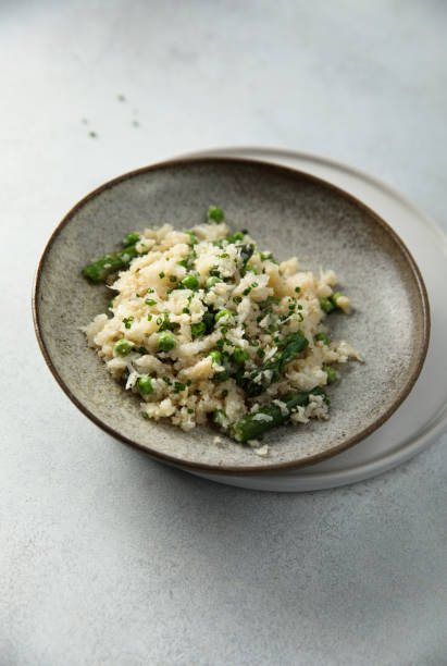 istock Cauliflower rice with green pea 1371928956