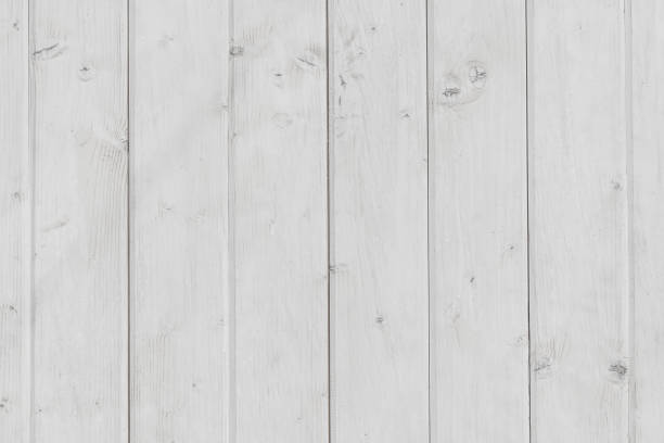 istock Background of weathered white planks, bright worn surface texture as graphic design element 1371930285