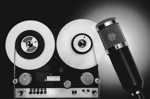 istock microphone and vintage tape recorder 1371930452